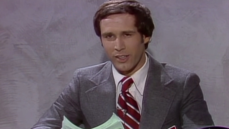 Chevy sits at Weekend Update desk