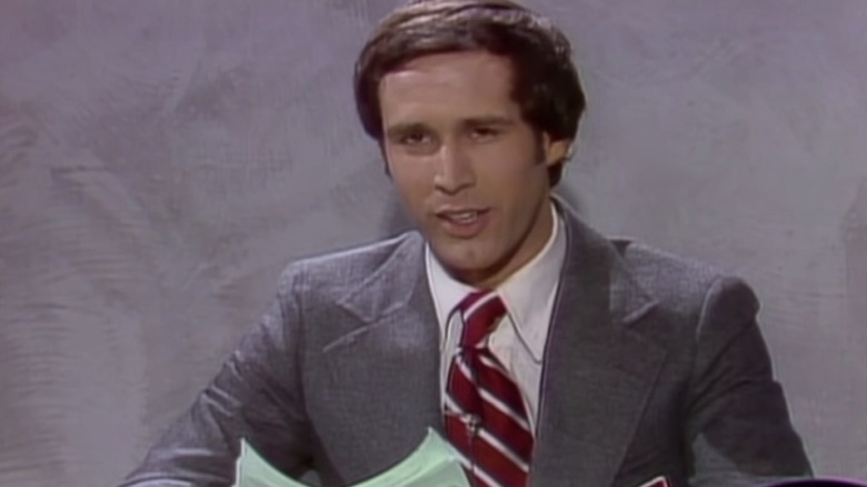 Chevy sits at Weekend Update desk