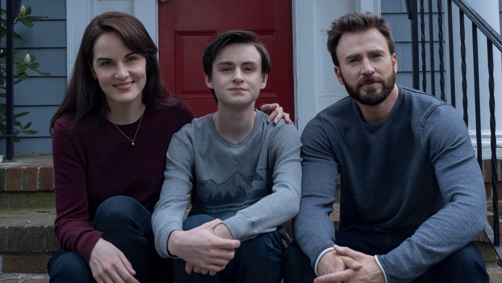 Chris Evans as Andy Barber, Michelle Dockery as Laurie Barber, and Jaeden Martell as Jacob Barber on Defending Jacob