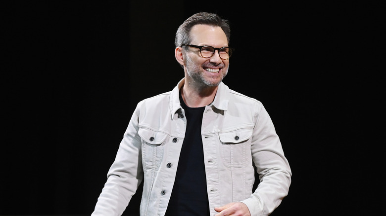 Christian Slater grinning