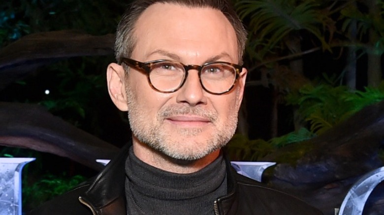 Christian Slater wearing glasses
