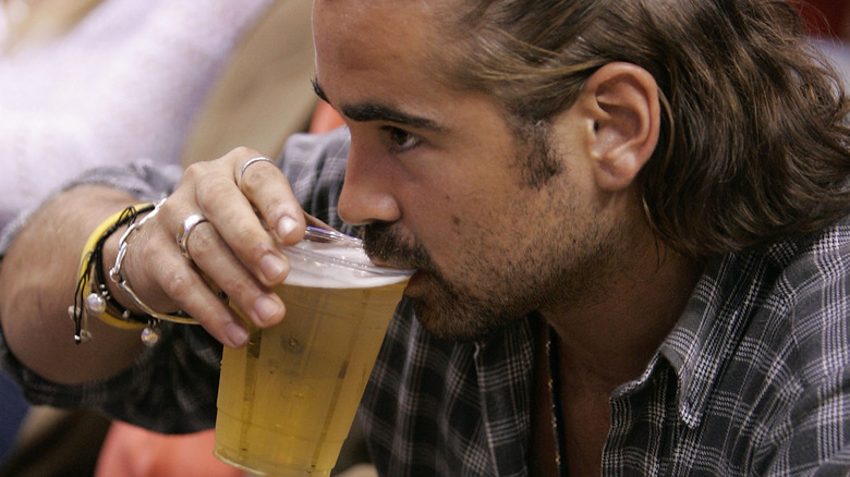 Colin Farrell drinking beer