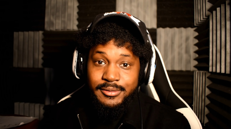 CoryxKenshin wearing headphones