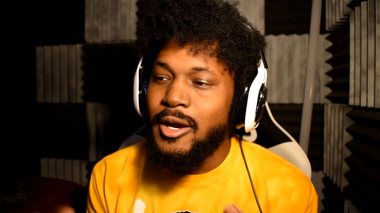 CoryxKenshin wearing yellow shirt