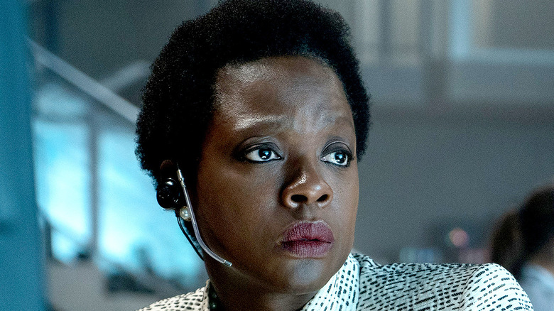 Amanda Waller wearing earpiece