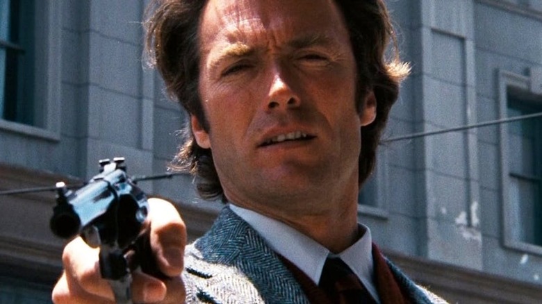 Clint Eastwood holding a gun