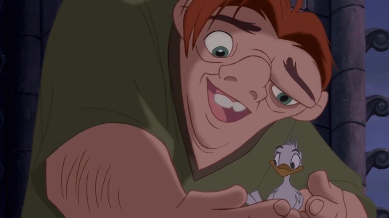 Quasimodo cradles a bird