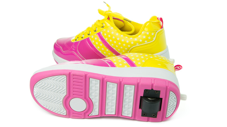 Bottom of pink and yellow Heelys