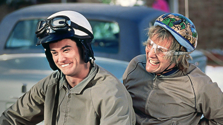 Lloyd smiling in a motorcycle helmet