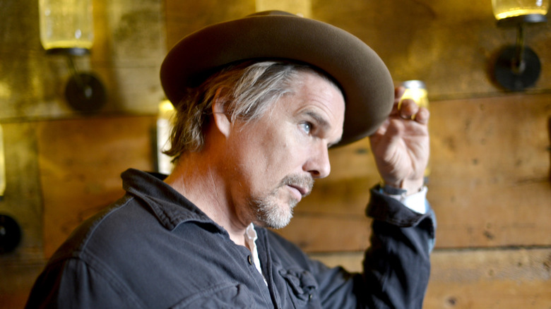 Ethan Hawke tipping hat