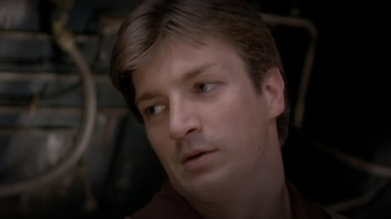 Nathan Fillion as Captain Mal on Firefly