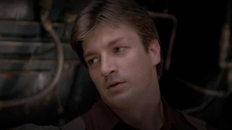 Nathan Fillion as Captain Mal on Firefly