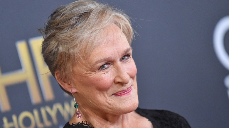 Glenn Close smiling in a black dress