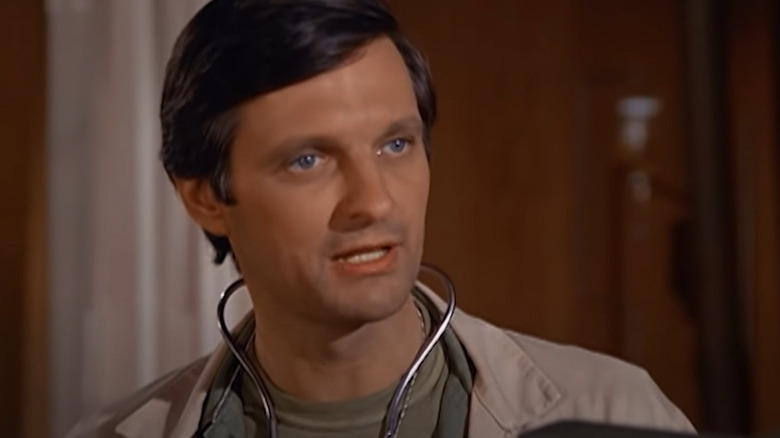 Hawkeye wearing stethoscope