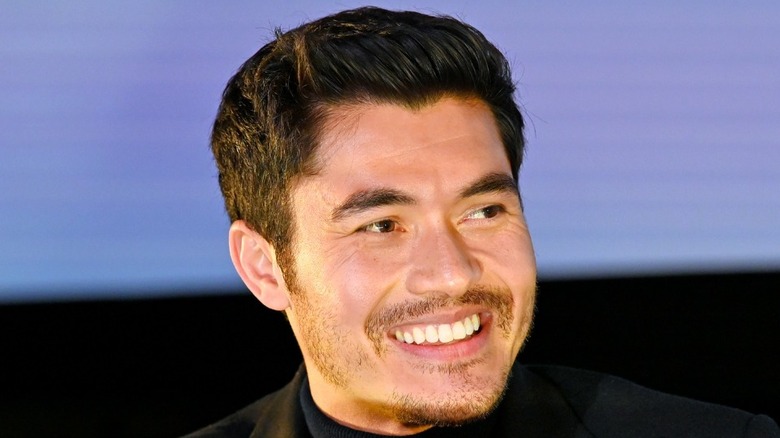 Henry Golding smiling