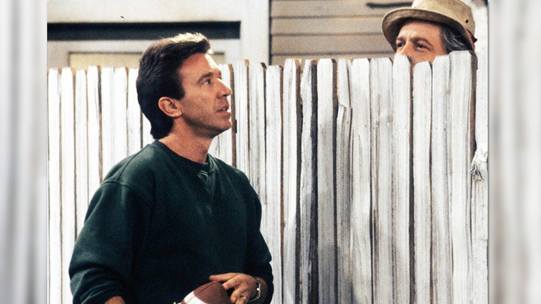 Tim talks to his neighbor