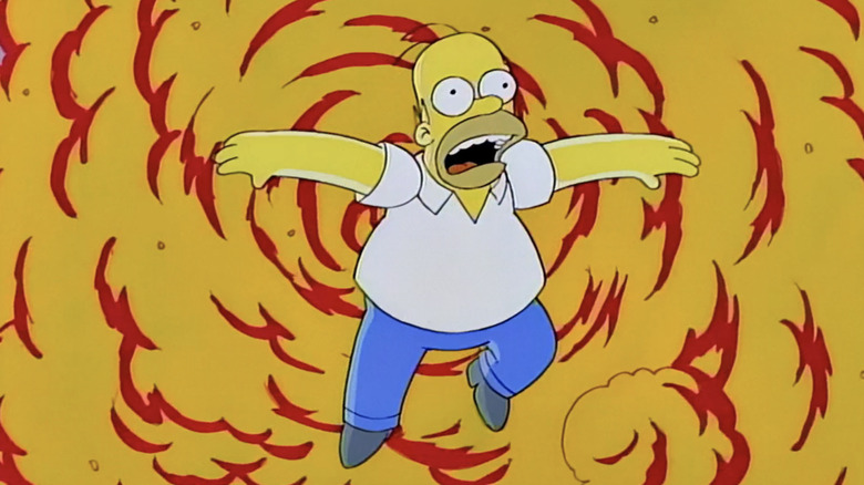 Homer Simpson leaps from an explosion