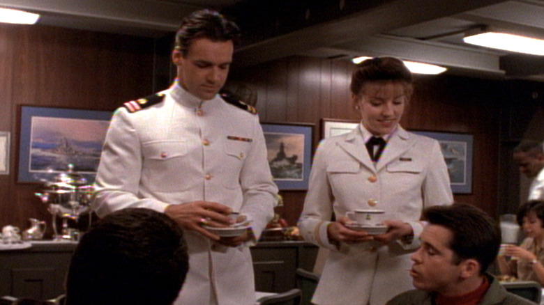 David James Elliot as Harm and Andrea Parker as Lt. Caitlin 'Kate' Pike in JAG