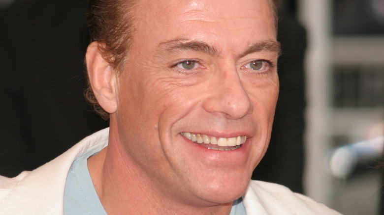 Jean-Claude Van Damme smiling on red carpet