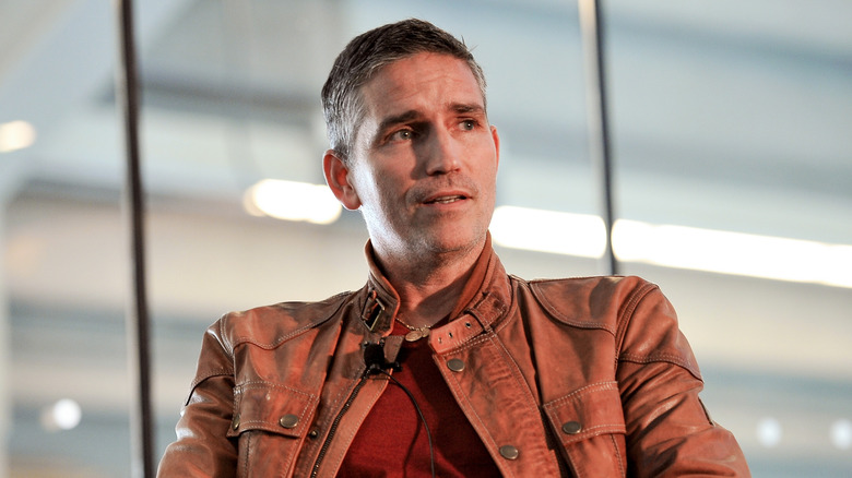 Jim Caviezel sitting