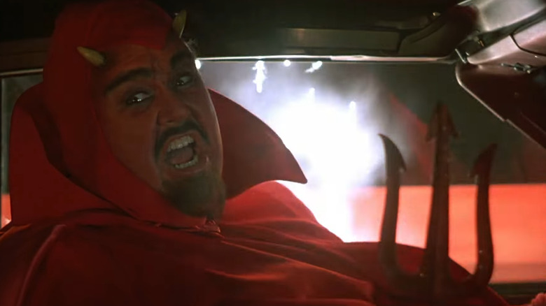 John Candy as the devil