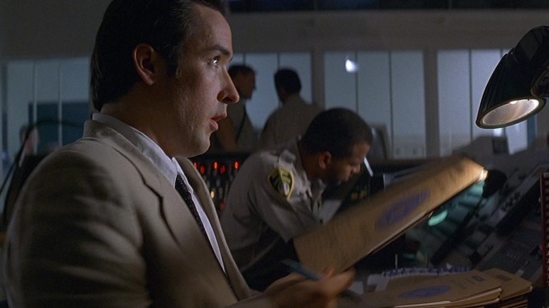 Vince Larkin in comm center in Con Air