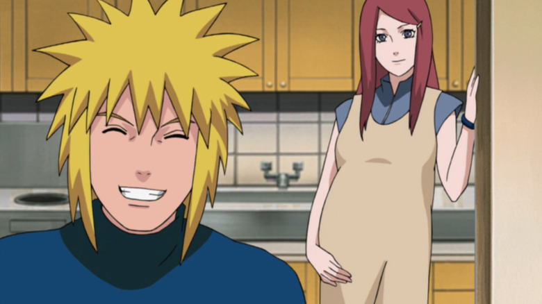 Minato grinning with pregnant Kushina