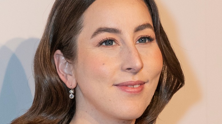 Alana Haim smiling at premiere