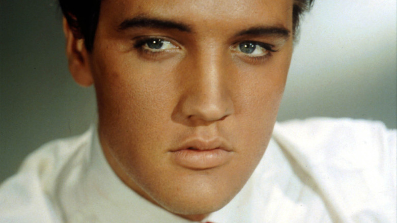 Elvis Presley in a white shirt