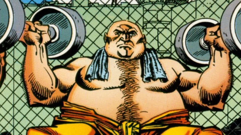 The Kingpin lifts weights in prison