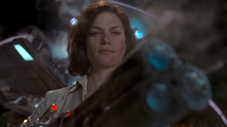Dr. Laurel Weaver holds blaster
