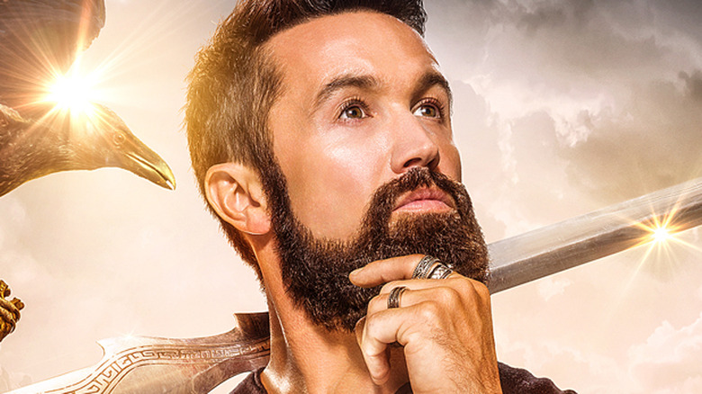 Rob McElhenney in close-up with sword