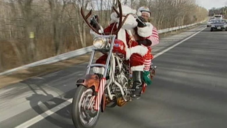Paul Sr. riding Santa bike