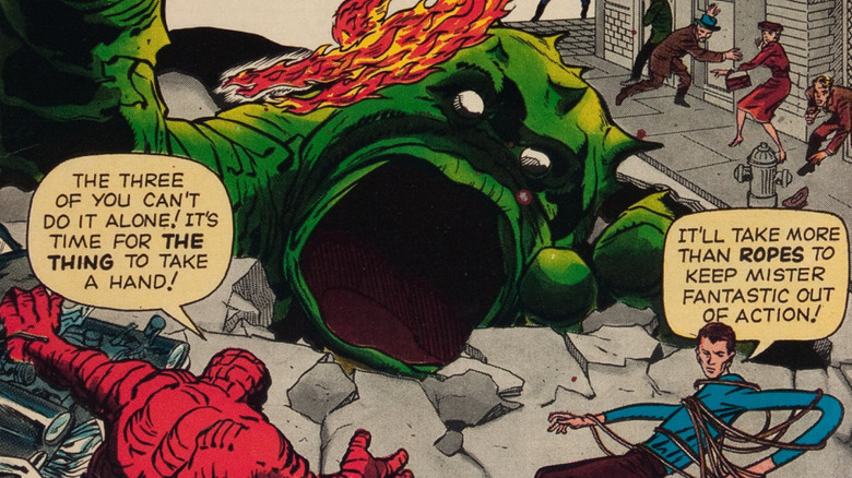 Fantastic Four fighting giant monster
