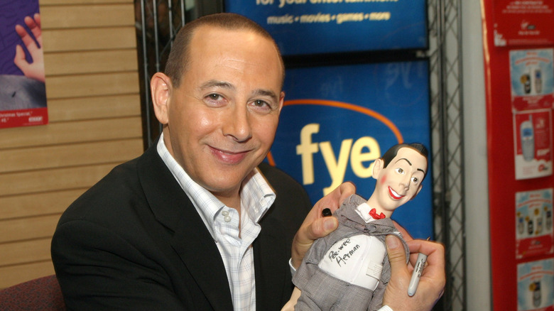 Paul Reubens with a Pee-wee doll