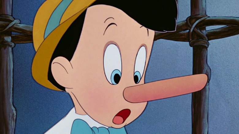 Pinocchio looking at nose shocked