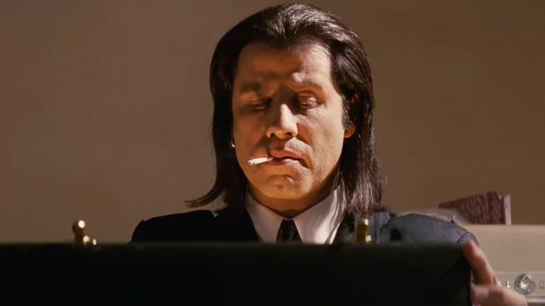 Vincent looking in briefcase