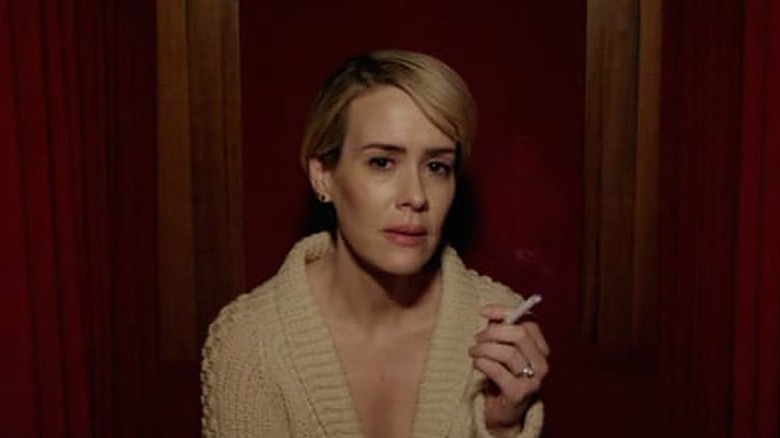 Audrey Tindall smokes cigarette