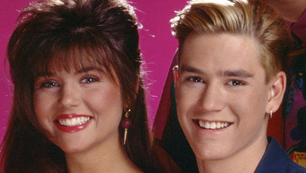 Mark Paul Gosselaar as Zack Morris and Tiffani Amber Thiessen as Kelly Kapowski from Saved by the Bell