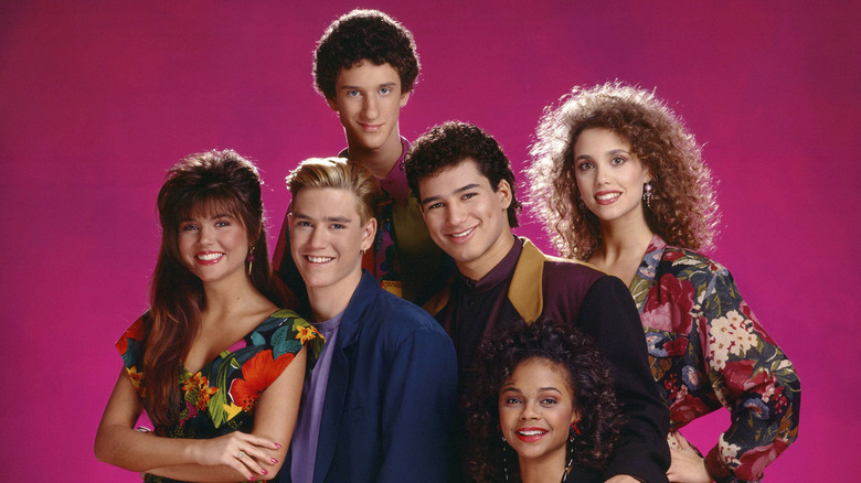 Mark Paul Gosselaar as Zack Morris and Tiffani Amber Thiessen as Kelly Kapowski from Saved by the Bell