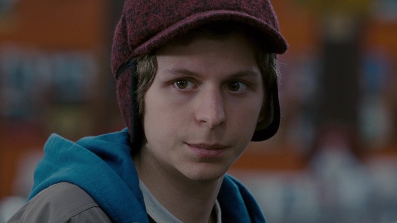 Scott Pilgrim wearing red hat