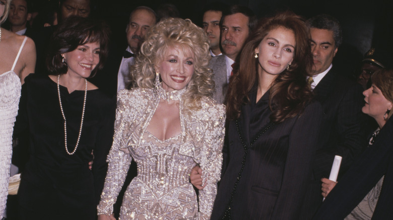 Field, Parton, and Roberts on red carpet