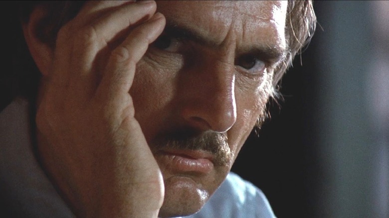Dennis Weaver in Duel with hand raised to face