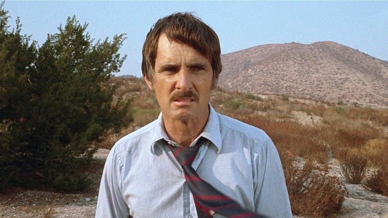 David Mann standing in the desert