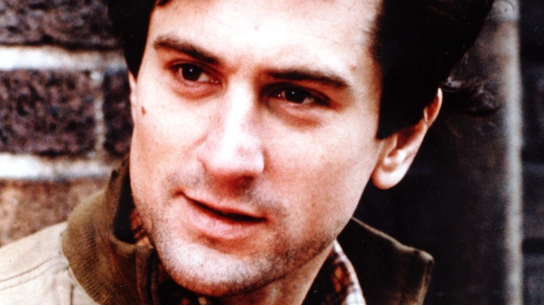 Robert De Niro looking to the side