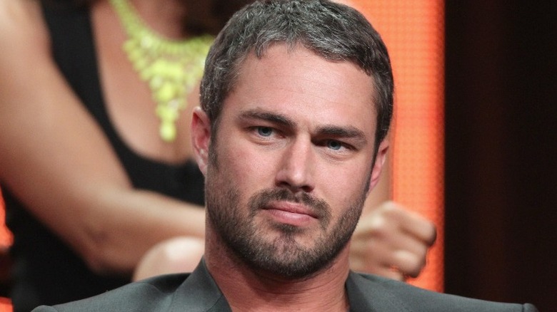 Taylor Kinney looking pensive