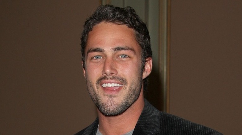 Taylor Kinney at event 
