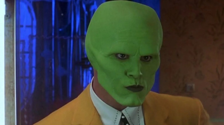 The Mask pursing his lips