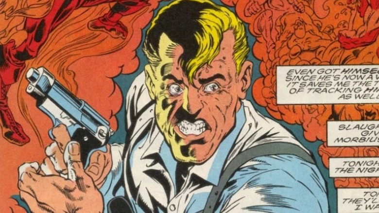 Simon Stroud holding a gun