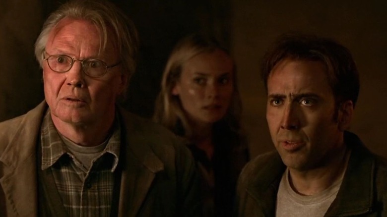 Nicolas Cage and friends inspecting things National Treasure